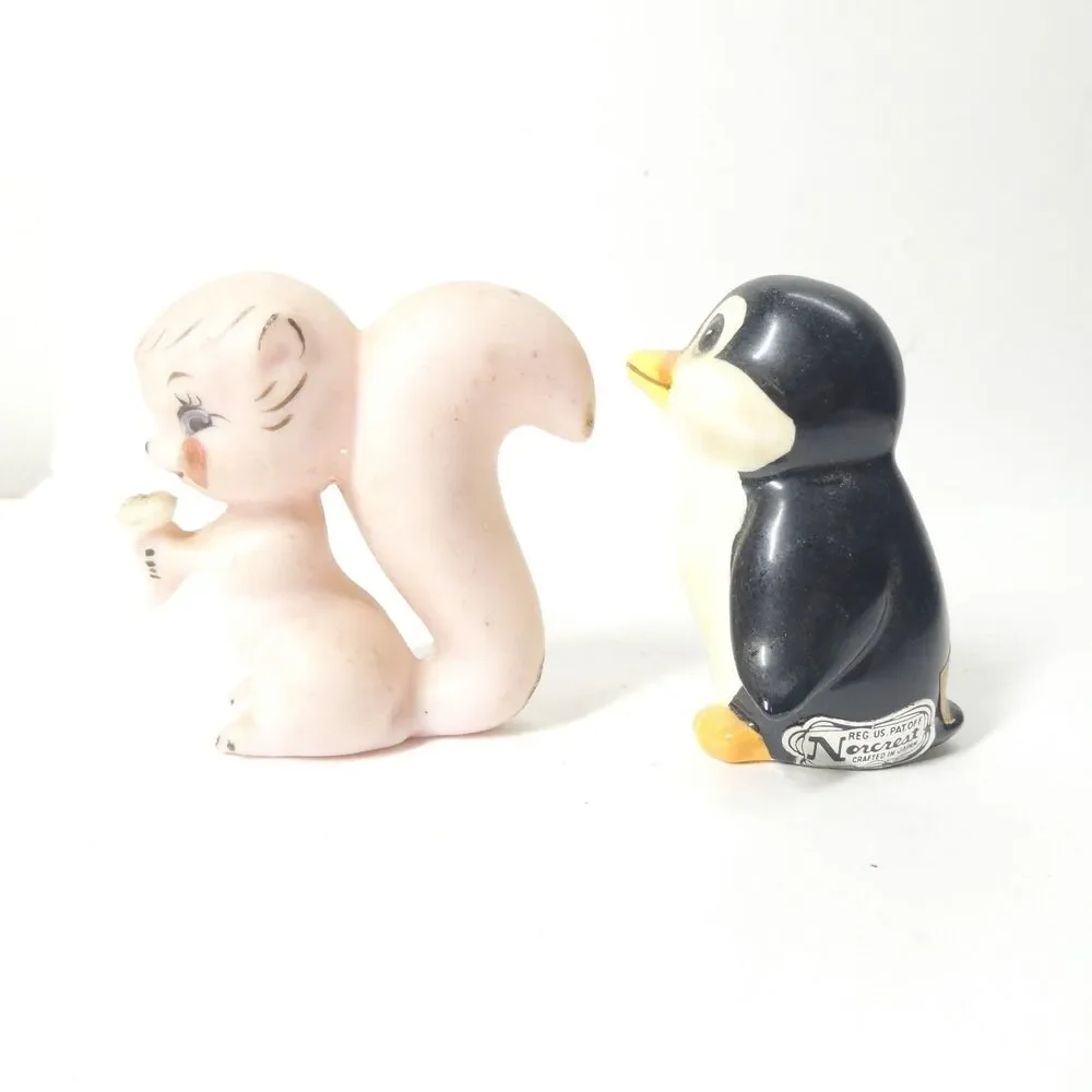 2 Norcrest Japan Salt Pepper Shakers Pink Skunk Squirrel + Penguin Vintage MCM